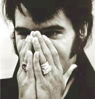 Elvis Presley Showing off His Rings
