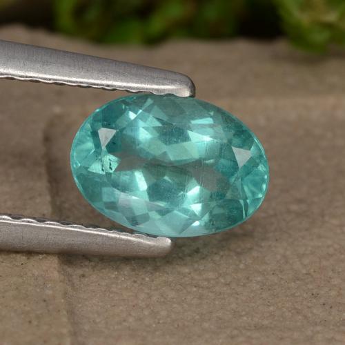 0.88캐럿 천연 강렬한 청록색 아파타이트, 타원형 컷, 6.9×4.9 mm, VS