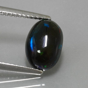 1.62캐럿 천연 멀티컬러 블랙 오팔, 타원형 컷, 10.2×7.2 mm, 불투명체
