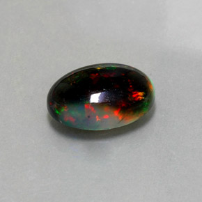 2.26캐럿 천연 멀티컬러 블랙 오팔, 타원형 컷, 12.1×8.2 mm, 불투명체