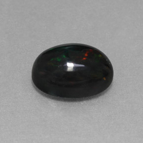 1.27캐럿 천연 멀티컬러 블랙 오팔, 타원형 컷, 9.1×7.1 mm, 불투명체