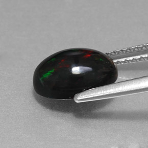 1.27캐럿 천연 멀티컬러 블랙 오팔, 타원형 컷, 9.1×7.1 mm, 불투명체