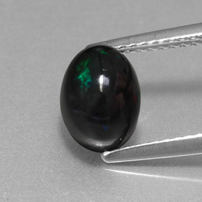 1.38캐럿 천연 멀티컬러 블랙 오팔, 타원형 컷, 8.2×6.2 mm, 불투명체