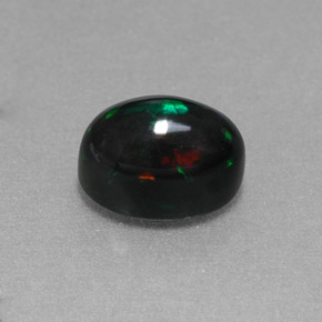 1.38캐럿 천연 멀티컬러 블랙 오팔, 타원형 컷, 8.2×6.2 mm, 불투명체