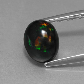 1.58캐럿 천연 멀티컬러 블랙 오팔, 타원형 컷, 9×7 mm, 불투명체