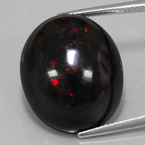 20.04캐럿 천연 멀티컬러 블랙 오팔, 타원형 컷, 21.6×17.8 mm, 불투명체