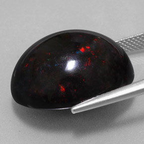20.04캐럿 천연 멀티컬러 블랙 오팔, 타원형 컷, 21.6×17.8 mm, 불투명체