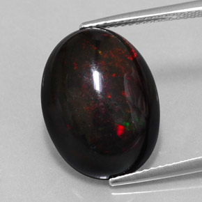 7.87캐럿 천연 멀티컬러 블랙 오팔, 타원형 컷, 17.9×13.4 mm, 불투명체
