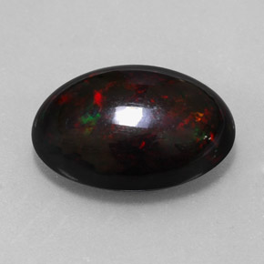 7.87캐럿 천연 멀티컬러 블랙 오팔, 타원형 컷, 17.9×13.4 mm, 불투명체