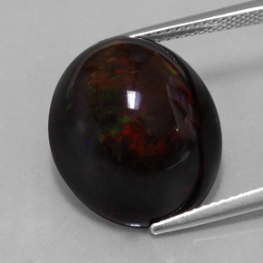 13.63캐럿 천연 멀티컬러 블랙 오팔, 타원형 컷, 17.9×15.2 mm, 불투명체