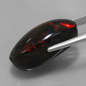 17.92캐럿 천연 멀티컬러 블랙 오팔, 타원형 컷, 24.4×12.9 mm, 불투명체