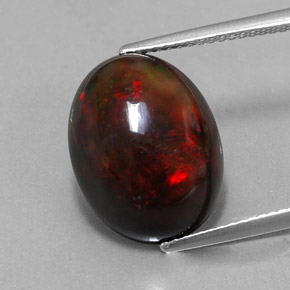 6.26캐럿 천연 멀티컬러 블랙 오팔, 타원형 컷, 15.9×12.3 mm, 불투명체
