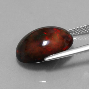 6.26캐럿 천연 멀티컬러 블랙 오팔, 타원형 컷, 15.9×12.3 mm, 불투명체
