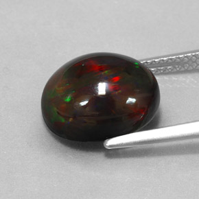 3.84캐럿 천연 멀티컬러 블랙 오팔, 타원형 컷, 12.2×10.1 mm, 불투명체