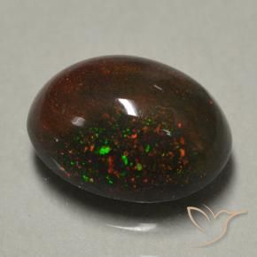 0.89캐럿 천연 멀티컬러 블랙 오팔, 타원형 컷, 8×6.1 mm, 불투명체