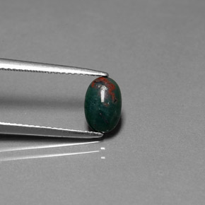 0.82캐럿 천연 점박이 그린 블러드스톤, 타원형 컷, 8.4×5.5 mm, 불투명체