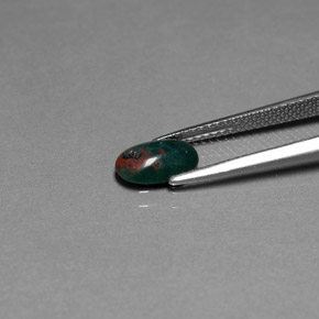 0.82캐럿 천연 점박이 그린 블러드스톤, 타원형 컷, 8.4×5.5 mm, 불투명체