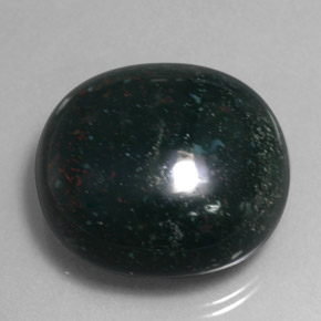 34.59캐럿 천연 점박이 그린 블러드스톤, 타원형 컷, 22.3×20.4 mm, 불투명체