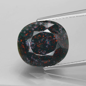 6.30캐럿 천연 점박이 그린 블러드스톤, 타원형 컷, 12.6×11.3 mm, 불투명체