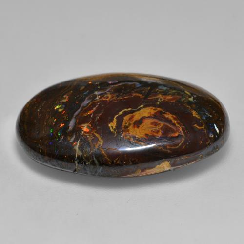 33.36캐럿 천연 멀티컬러 볼더 오팔, 타원형 컷, 28.1×19 mm, 불투명체