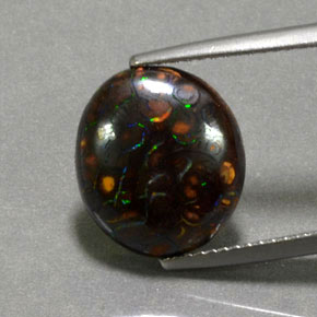 6.61캐럿 천연 멀티컬러 볼더 오팔, 타원형 컷, 13.3×11.8 mm, 불투명체