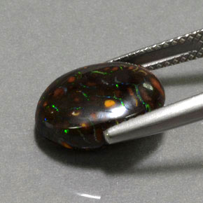 6.61캐럿 천연 멀티컬러 볼더 오팔, 타원형 컷, 13.3×11.8 mm, 불투명체