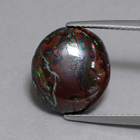 6.51캐럿 천연 멀티컬러 볼더 오팔, 타원형 컷, 13.1×11.7 mm, 불투명체