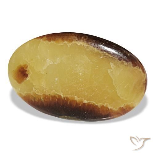 54.86캐럿 천연 멀티컬러 칼사이트, 타원형 컷, 40.2×25.1 mm, 불투명체