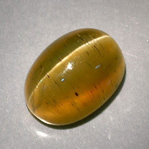 3.32캐럿 천연 허니 Cat's Eye Apatite, 타원형 컷, 9.2×6.8 mm, 투명한