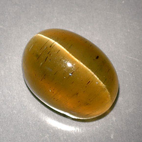 3.32캐럿 천연 허니 Cat's Eye Apatite, 타원형 컷, 9.2×6.8 mm, 투명한