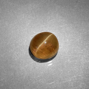 1.61캐럿 천연 허니 Cat's Eye Apatite, 타원형 컷, 6.2×5.7 mm, 투명한