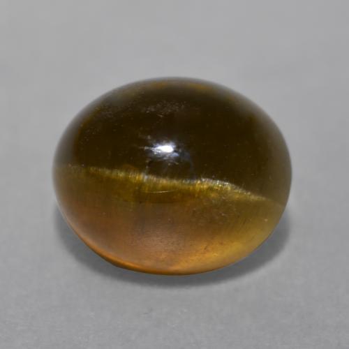 7.22캐럿 천연 딥 오렌지 브라운 Cat's Eye Apatite, 타원형 컷, 11.4×9.4 mm, 투명한