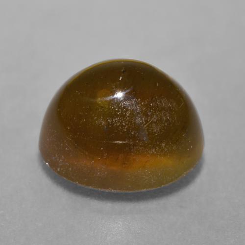 7.22캐럿 천연 딥 오렌지 브라운 Cat's Eye Apatite, 타원형 컷, 11.4×9.4 mm, 투명한