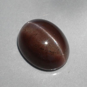 5.30캐럿 천연 다크 브라운 Cat's Eye Scapolite, 타원형 컷, 12.1×9.6 mm, 투명한