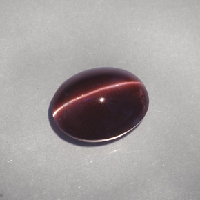 4.26캐럿 천연 어두운 갈색 캣츠아이 스카폴라이트, 타원형 컷, 투명한