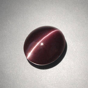 4.00캐럿 천연 다크 브라운 Cat's Eye Scapolite, 타원형 컷, 10.6×9.1 mm, 불투명체