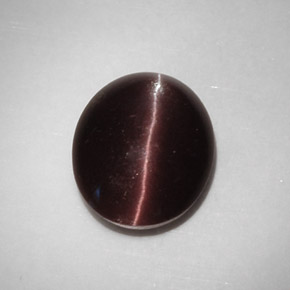5.88캐럿 천연 다크 브라운 Cat's Eye Scapolite, 타원형 컷, 12.9×10.7 mm, 투명한