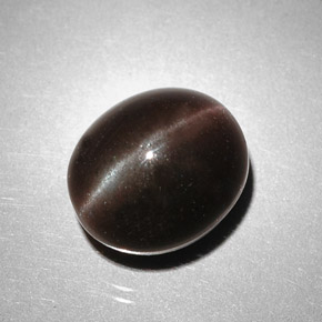 5.85캐럿 천연 어두운 갈색 캣츠아이 스카폴라이트, 타원형 컷, 투명한