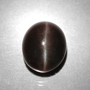 5.85캐럿 천연 어두운 갈색 캣츠아이 스카폴라이트, 타원형 컷, 투명한