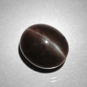 5.85캐럿 천연 어두운 갈색 캣츠아이 스카폴라이트, 타원형 컷, 투명한