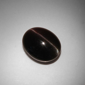 11.50캐럿 천연 다크 브라운 Cat's Eye Scapolite, 타원형 컷, 15×12.1 mm, 투명한