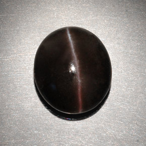 6.82캐럿 천연 다크 브라운 Cat's Eye Scapolite, 타원형 컷, 13×11.2 mm, 투명한