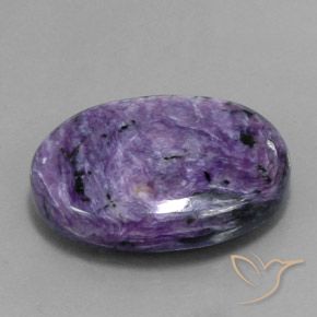 34.07캐럿 천연 모브 바이올렛 차로아이트, 타원형 컷, 27.9×21.2 mm, 불투명체