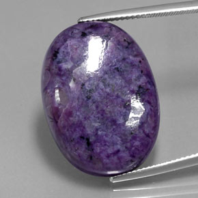 28.97캐럿 천연 미디엄 다크 바이올렛 차로아이트, 타원형 컷, 25.4×18.5 mm, 불투명체