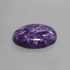 15.17캐럿 천연 바이올렛 차로아이트, 타원형 컷, 22.1×16.2 mm, 불투명체