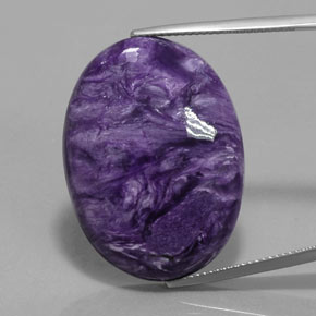 28.09캐럿 천연 바이올렛 차로아이트, 타원형 컷, 30.1×22.2 mm, 불투명체
