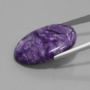 28.09캐럿 천연 바이올렛 차로아이트, 타원형 컷, 30.1×22.2 mm, 불투명체