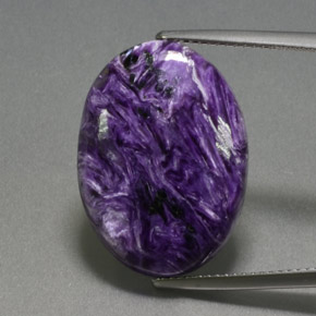 13.86캐럿 천연 바이올렛 차로아이트, 타원형 컷, 22.2×16.1 mm, 불투명체
