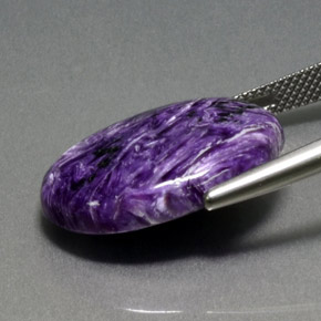 13.86캐럿 천연 바이올렛 차로아이트, 타원형 컷, 22.2×16.1 mm, 불투명체
