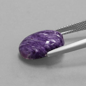 5.59캐럿 천연 바이올렛 차로아이트, 타원형 컷, 14.2×10.2 mm, 불투명체